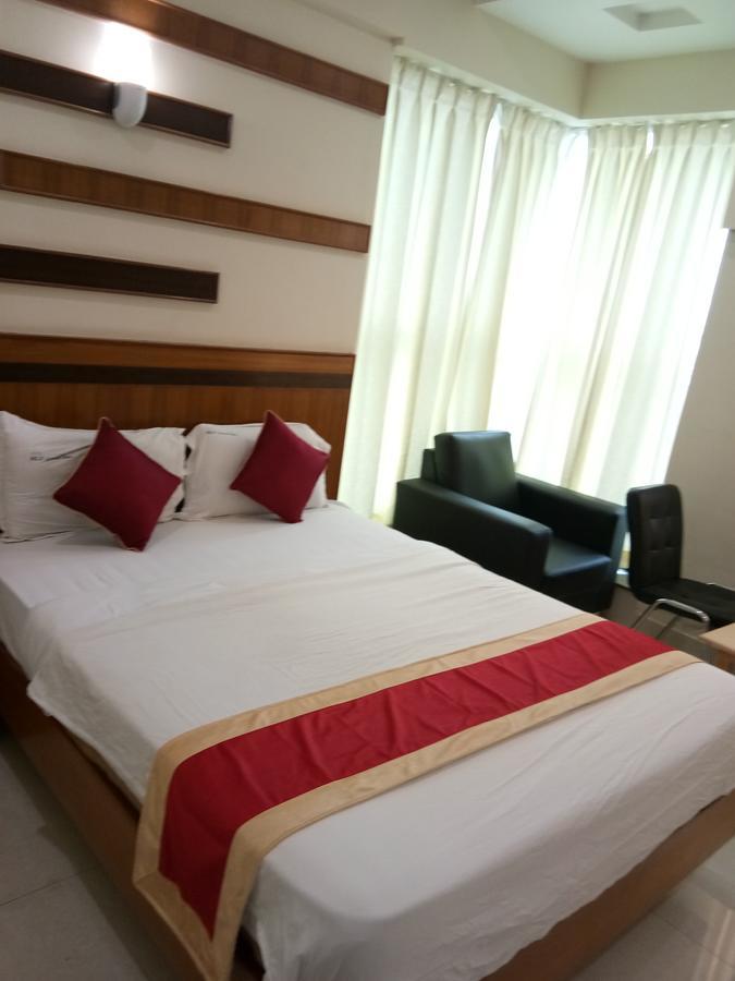 Hlv Grand Inn Bangalore Esterno foto